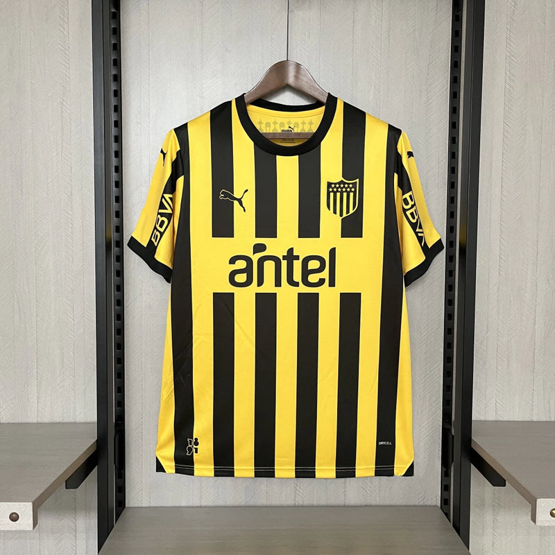 Camisa Peñarol Home I 2024/25 Torcedor Masculina Amarela e Preta, uniforme clássico, futebol uruguaio, escudo bordado, conforto, estilo e tradição para torcedores"