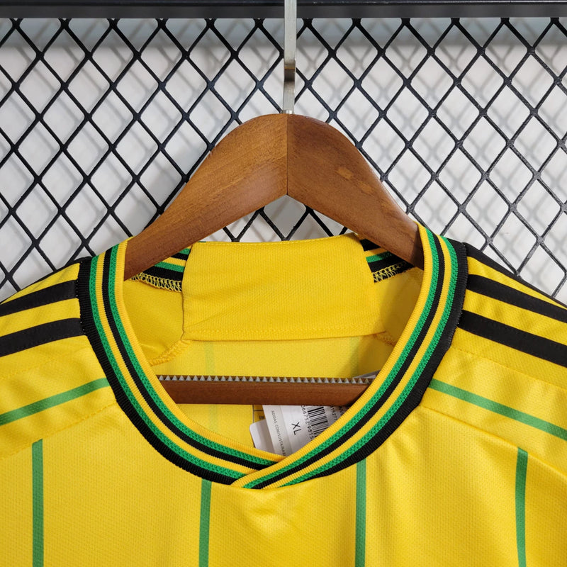 Camisa Jamaica Home I 2023/24 Adidas Torcedor Masculina amarela, uniforme principal da seleção jamaicana, detalhes em verde e preto, tecido leve e respirável, corte masculino."
camisa Jamaica Home 2023/24 amarela
camisa Adidas Jamaica torcedor masculina
uniforme principal seleção Jamaica
camisa Reggae Boyz 2023/24