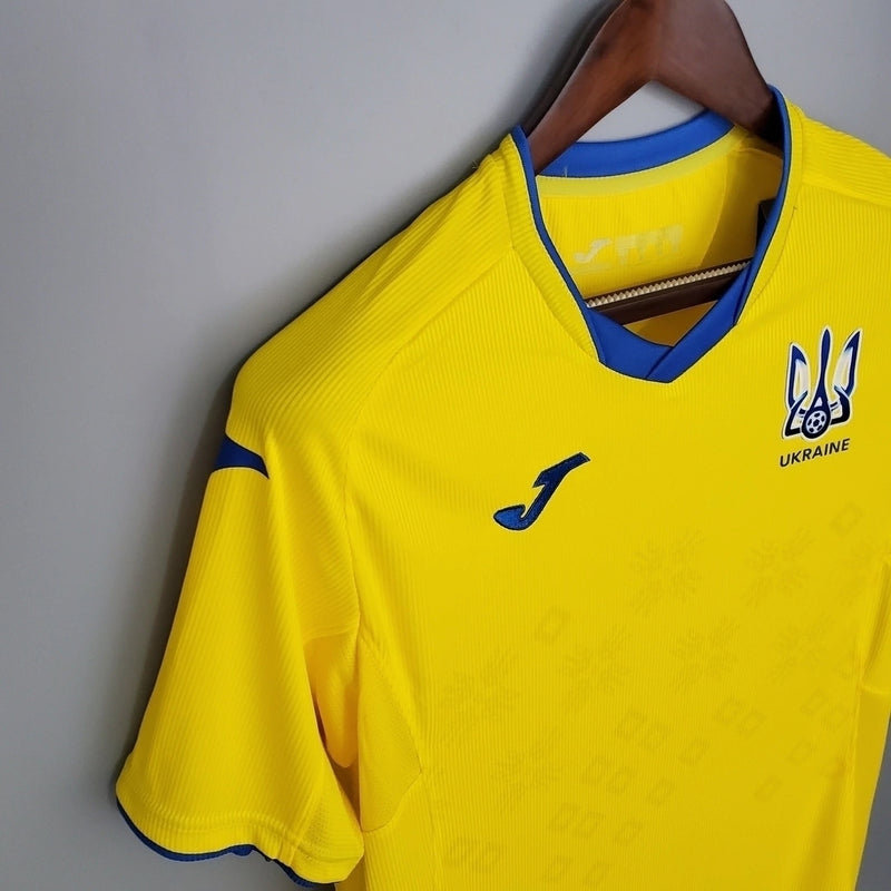 Camisa Ucrânia Home I 2020/21 masculina amarela com detalhes em azul, gola careca e tecido leve respirável para torcedores"