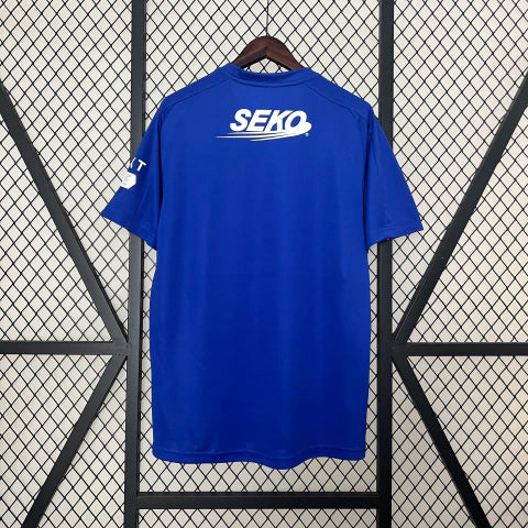 Camisa Rangers Home I 2024/25 Castore Torcedor Masculina Azul, design moderno com detalhes clássicos, conforto e tradição para torcedores do Rangers FC.”