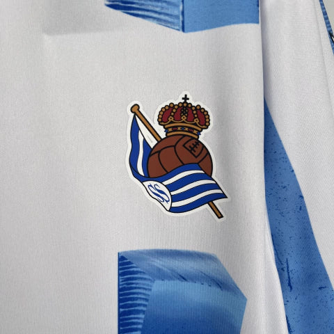 Camisa Real Sociedad Home I 2023/24 Torcedor Masculina - Branca e Azul