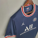 Camisa PSG Home I 2021/22 Jordan Torcedor Masculina Azul, uniforme do Paris Saint-Germain, design elegante, conforto e estilo para torcedores apaixonados.”