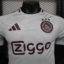 "Camisa Ajax Third (3) 2024/25 Adidas Jogador Masculina oficial, versão player issue, cor preta com detalhes modernos, escudo em termotransfer e tecnologia HEAT.RDY para máximo desempenho.