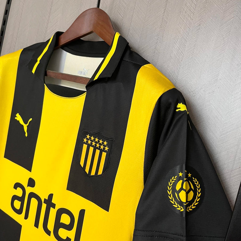 Camisa Peñarol Home I 2025/26 Torcedor Masculina Amarela e Preta, uniforme clássico, futebol uruguaio, escudo bordado, conforto, estilo e tradição para torcedores"