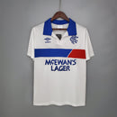 “Camisa Rangers FC Away II 1994/95 Umbro Retrô Masculina Branca, uniforme retrô clássico do Rangers, design nostálgico e confortável para torcedores apaixonados.”