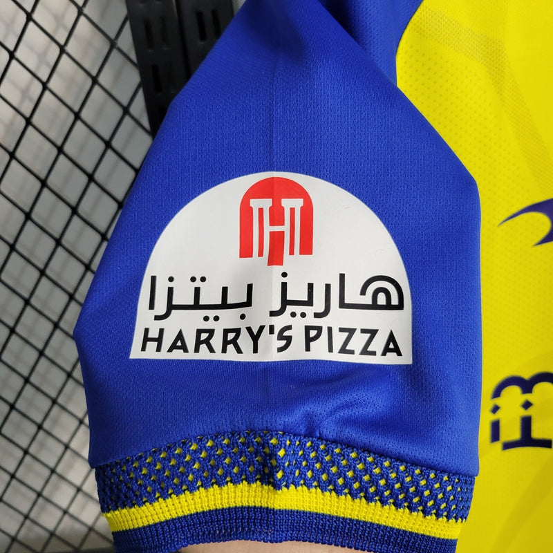 Camisa Al-Nassr Home 2022/23 Torcedor Masculina amarela da Adidas, modelo titular do time saudita, uniforme de futebol confortável em poliéster respirável, ideal para jogos, colecionadores e fãs do clube árabe.