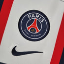 Camisa PSG Home I 2022/23 Nike Torcedor Masculina Azul, modelo tradicional com faixa central branca e detalhes vermelhos, design clássico do Paris Saint-Germain.”