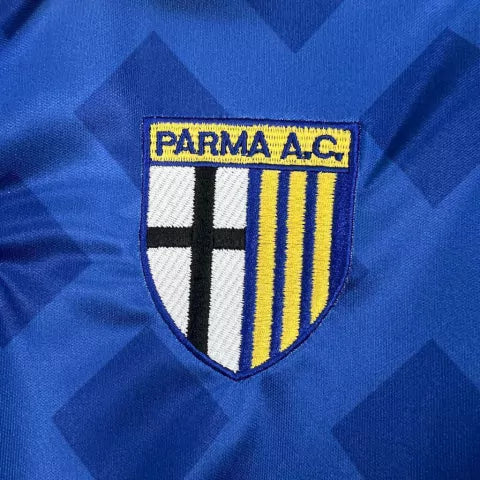 Camisa Parma Away II 1995/96 Puma Retrô Masculina Azul com detalhes amarelos, escudo histórico bordado e design clássico inspirado na era de ouro do futebol italiano.”