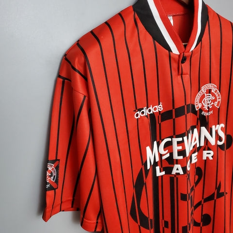 “Camisa Rangers FC Away II 1994/95 Adidas Retrô Masculina Laranja, uniforme retrô clássico do Rangers, design vibrante dos anos 90 e conforto para torcedores apaixonados.”