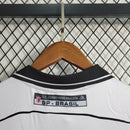 Camisa Corinthians retrô branca 1999 da Topper com escudo antigo e gola polo.