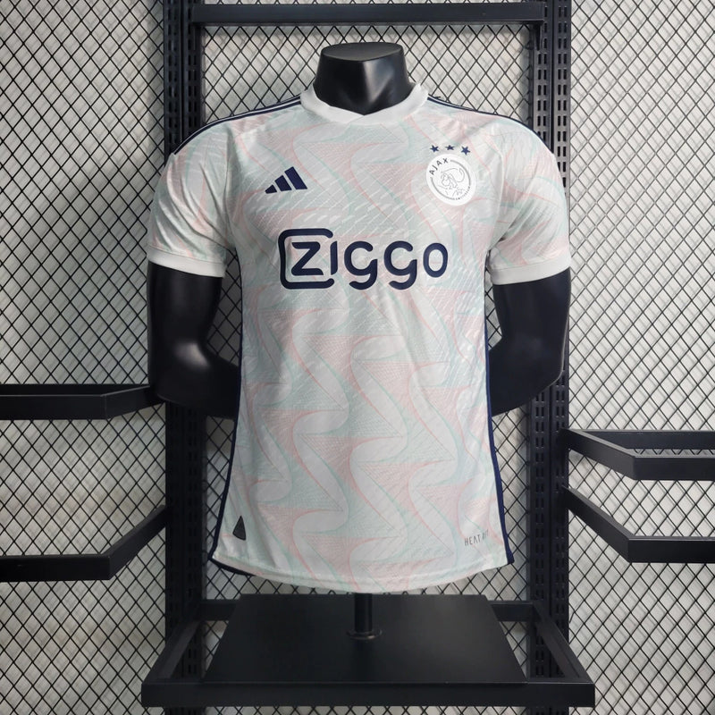 Camisa Ajax Away (2) 2023/24 Adidas Jogador Masculina azul petróleo com detalhes em preto e dourado, versão player issue oficial usada pelos atletas, produto original para torcedores e colecionadores.
