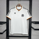 Camisa Alemanha Home I 1986/87 Adidas Retrô Masculina branca com detalhes em preto, tecido leve e respirável, corte masculino – perfeita para torcer, colecionar e uso casual.