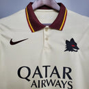 Camisa Roma Away II 2020/21 Nike Retrô Masculina marfim, com detalhes em bordô e dourado, gola polo e escudo bordado da Roma.