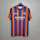 Camisa Rangers FC Away II 1993/94 Adidas Retrô Masculina Laranja, uniforme retrô clássico do Rangers, design vibrante e nostálgico dos anos 90 para torcedores apaixonados.”