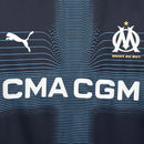 Camisa Olympique Marseille Away II 2025/26 Puma Torcedor Masculina Azul, com tecnologia dryCELL, escudo do OM aplicado e design moderno inspirado no Mediterrâneo.”