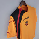 Camisa Roma Third III 2005/06 Retrô Masculina laranja, com detalhes em grená e amarelo, escudo bordado da Roma e logo Adidas retrô.