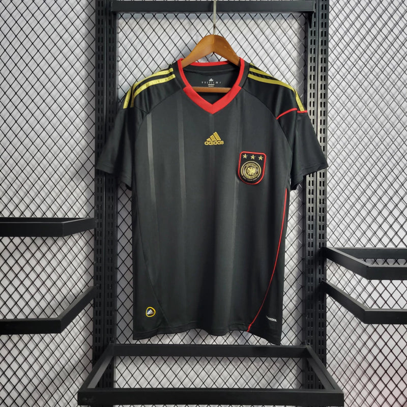 Camisa Alemanha Away II 2010/11 Adidas Retrô Masculina branca com detalhes em preto e vermelho, tecido leve e respirável, corte masculino – ideal para torcer, colecionar e uso casual.