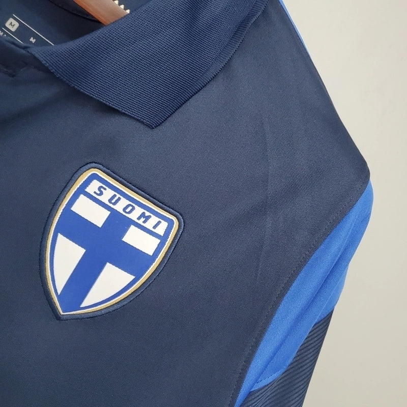 Camisa Finlândia Away II 2020/21 Nike retrô masculina azul marinho com detalhes brancos e dourados, gola redonda e mangas curtas, modelo clássico em tecido leve e respirável para torcedores e colecionadores"
