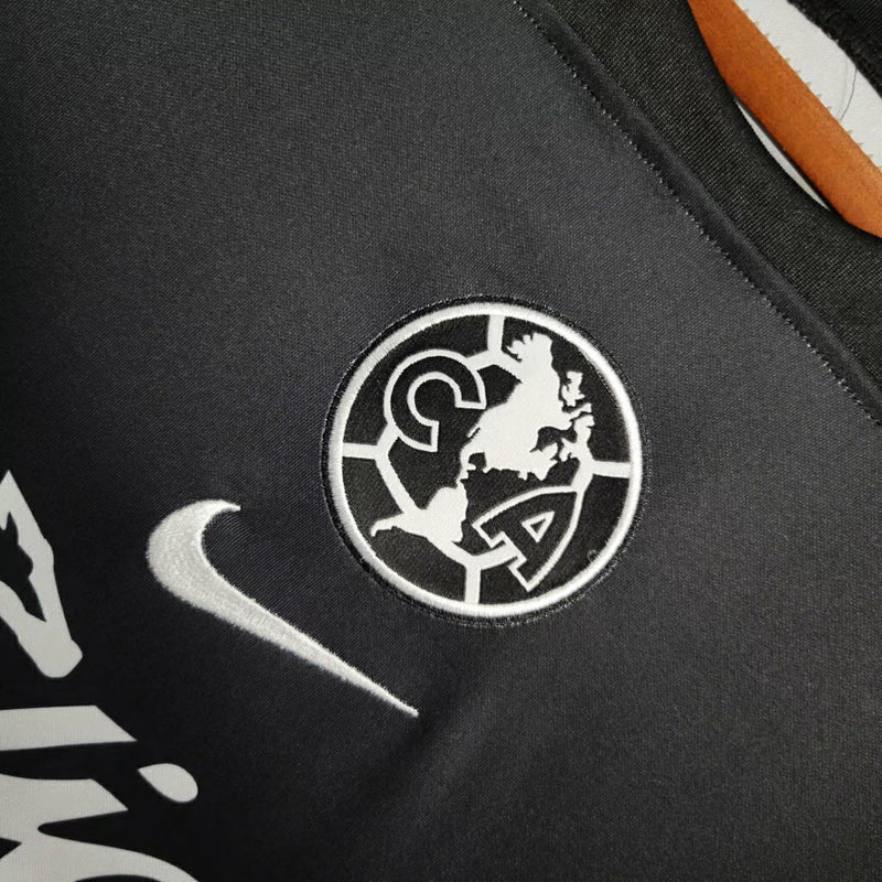 Camisa Club América Treino 2023/24 Torcedor Masculina Preta Nike, uniforme de treino leve e confortável, futebol mexicano, estilo esportivo para torcedores"