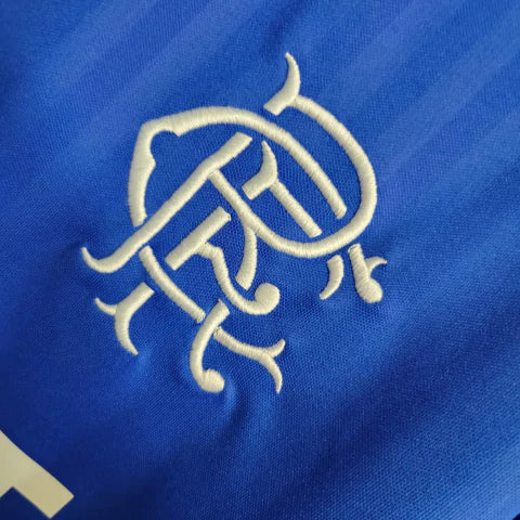 Camisa Rangers FC Home I 2023/24 Castore Torcedor Masculina Azul, uniforme moderno do clube escocês com escudo bordado e design elegante.