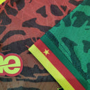 Camisa Camarões Home I 2024/25 Jogador Masculina verde, com detalhes em vermelho e amarelo da bandeira, tecido leve e respirável de alta performance, inspirada no uniforme oficial dos Leões IndomáveisCamisa Camarões Home I 2024/25 Jogador
Camisa Camarões verde masculina
Camisa seleção Camarões jogador
Camisa Camarões torcedor 2024/25
Camisa Leões Indomáveis home 2024
Camisa Camarões uniforme atleta