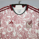 Camisa México Away II 2022/23 Adidas Torcedor Masculina branca com detalhes em vermelho, design inspirado na cultura mexicana, tecido leve e confortável para torcedores apaixonados pelo futebol