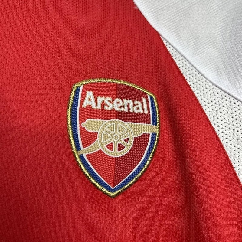 Camisa Arsenal Home I 2002/03 Nike Retrô Masculina, vermelho com mangas brancas, escudo do Arsenal bordado, gola tradicional, ideal para colecionadores e torcedores.
