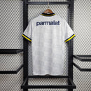 Camisa Boca Juniors Away (2) 1992/96 Olan Retrô Masculina azul escura com faixa amarela horizontal, gola polo com botões e escudo bordado clássico.
