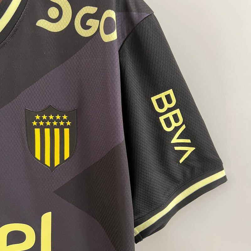 Camisa Peñarol Away II 2023/24 Torcedor Masculina Preta, uniforme uruguaio Puma, escudo bordado, tradição carbonera, conforto e estilo para torcedores"