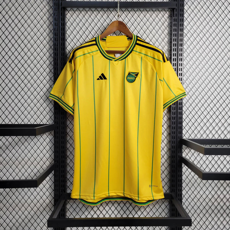 Camisa Jamaica Home I 2023/24 Adidas Torcedor Masculina amarela, uniforme principal da seleção jamaicana, detalhes em verde e preto, tecido leve e respirável, corte masculino."
camisa Jamaica Home 2023/24 amarela
camisa Adidas Jamaica torcedor masculina
uniforme principal seleção Jamaica
camisa Reggae Boyz 2023/24