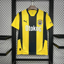 Camisa Fenerbahçe Home I 2024/25 Puma masculina em amarelo vibrante com escudo bordado, logo Puma e tecido respirável dryCELL, ideal para torcer ou treinar com conforto e estilo."