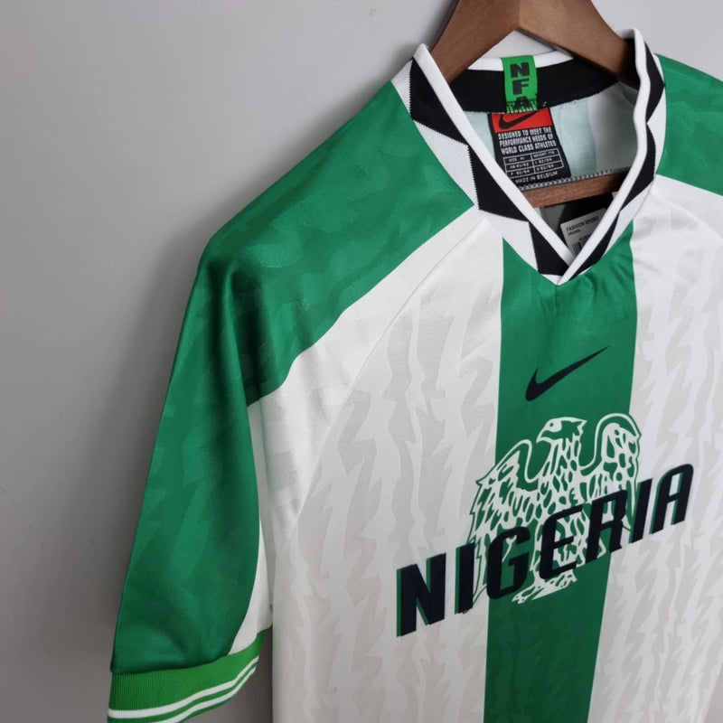 Camisa Nigéria Away II 1996/97 Nike retrô masculina branca
Camisa retrô Nigéria 1996 1997 Nike Away branca masculina
Uniforme reserva Nigéria 96/97 Nike retrô branco
Camisa de futebol retrô seleção da Nigéria Away Nike branca 1996
Camisa Nigéria anos 90 retrô Away II Nike branca masculina